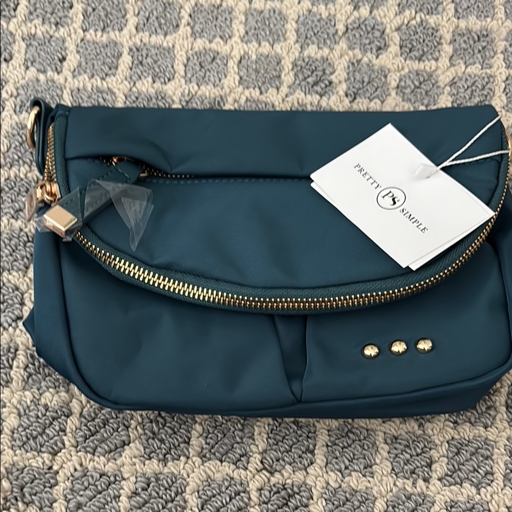 Pretty simple Teal Crossbody Bag. Brand new